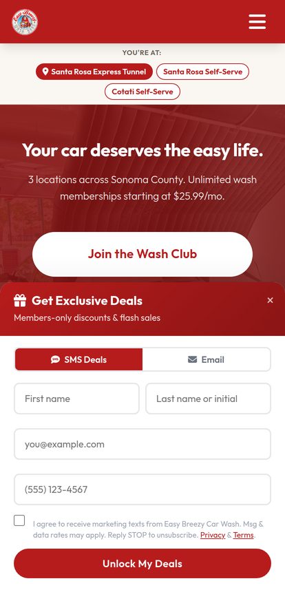 The Easy Breezy Car Wash website on a phone